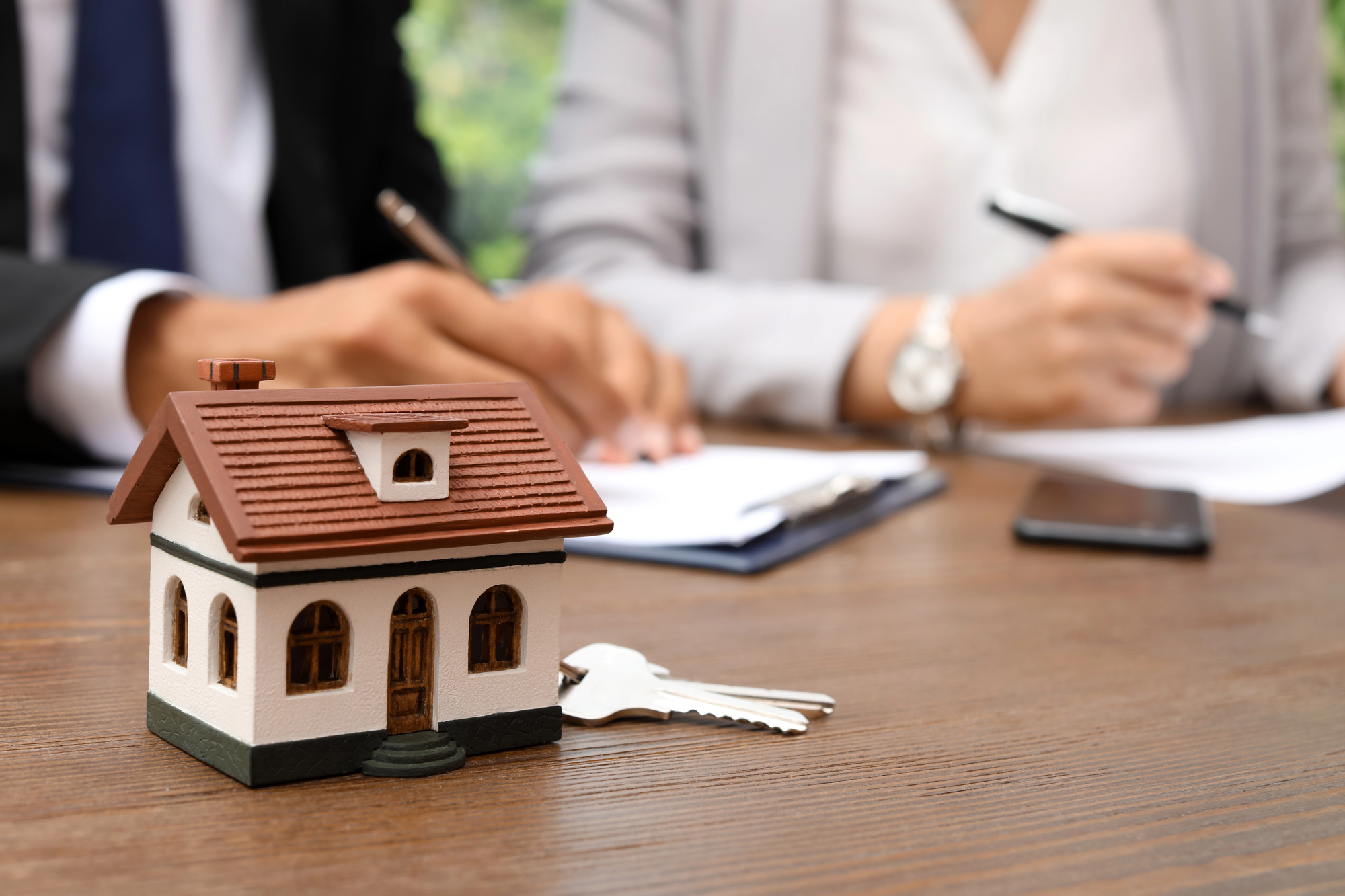 Florida home buyer and seller reviewing closing documents